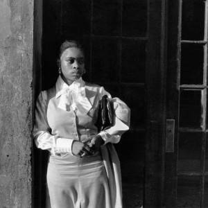 A-Woman-Waiting-in-the-Doorway-300x300