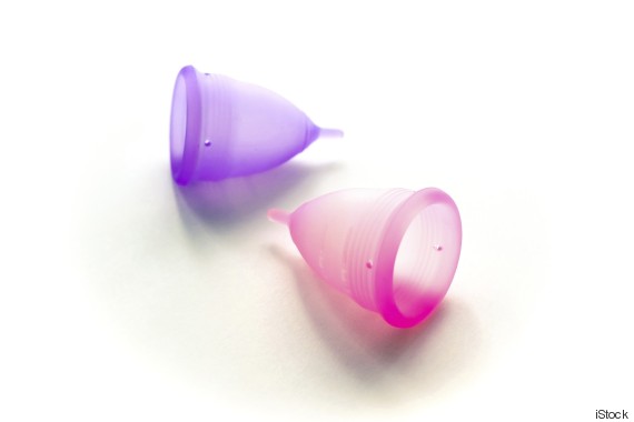 Two menstrual cups isolated on white background. Selective focus and shallow DOF